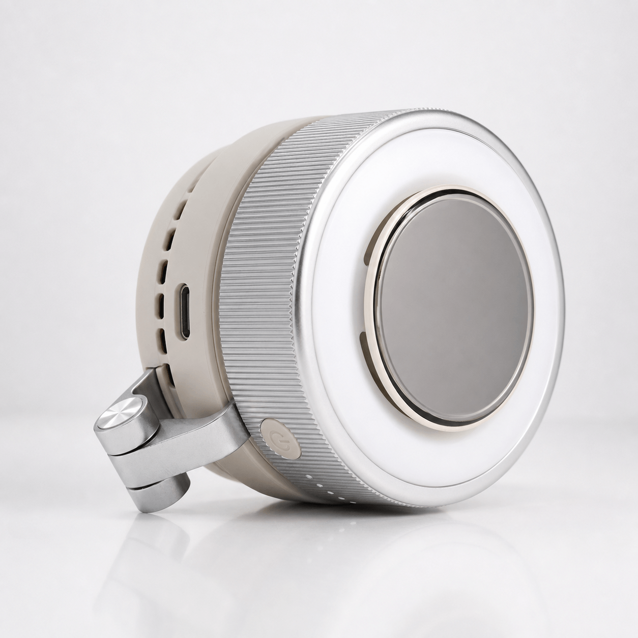 GlowClip magnetic phone fan and ring light accessory in silver white, featuring a compact foldable design for content creators and travel vlogging.