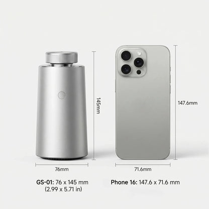 Dimension comparison diagram showing the silver StellTails GS-01 smart car diffuser (76x145mm) next to a smartphone to demonstrate compact cup holder compatibility.