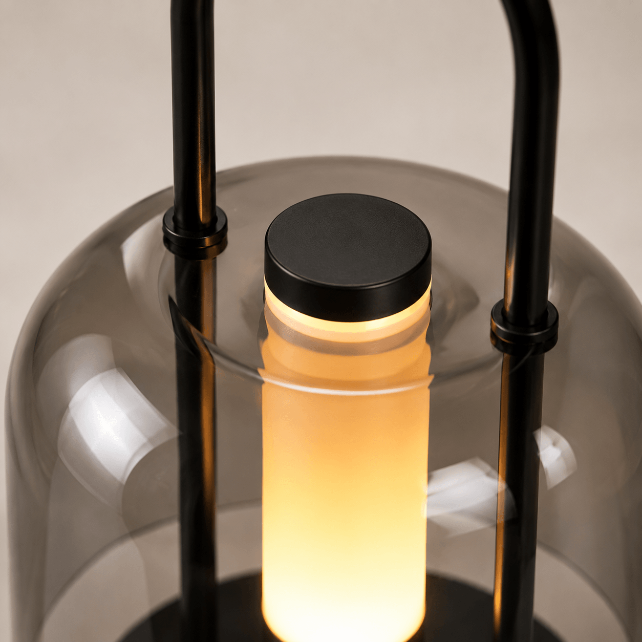 Modern cordless table lamp with refined metal frame and soft ambient lighting for home decor