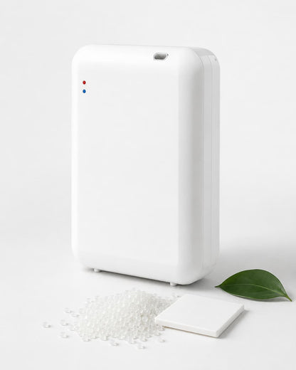 StellTails SL-02 sleek white waterless scent diffuser crafted from durable eco-friendly PP material with green leaf and resin granules.