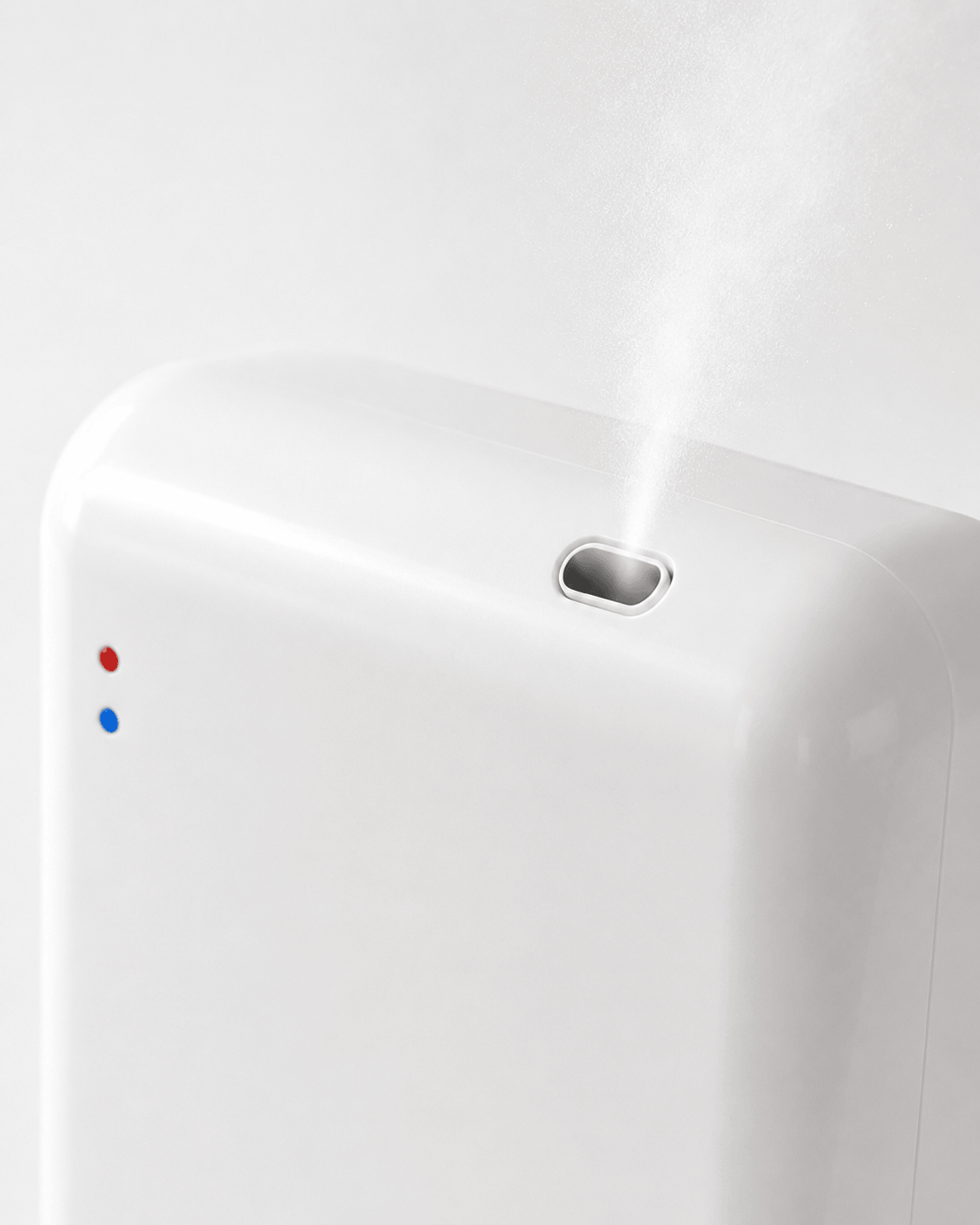 Close-up of the StellTails SL-02 waterless diffuser top atomizing nozzle dispersing a fine scent mist, highlighting precision engineering and indicator lights.