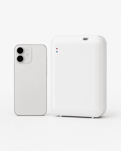 StellTails SL-02 white waterless scent diffuser next to a smartphone, showing its ultra-compact, portable dimensions for versatile placement.