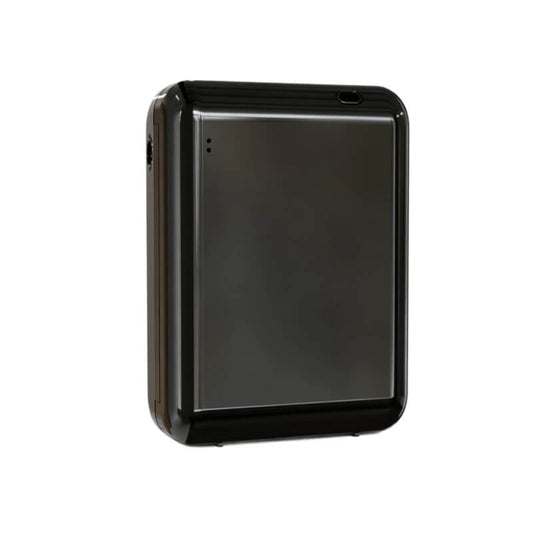 StellTails SL-02 waterless scent diffuser in polished black finish, featuring a compact, low-profile design built for subtle luxury interiors.